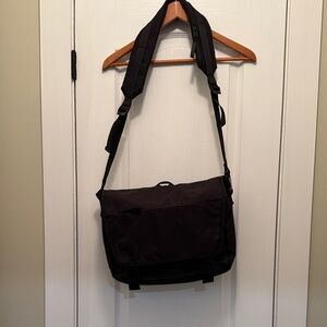 General Supply Goods and Co. Black Messenger Bag with multiple compartments